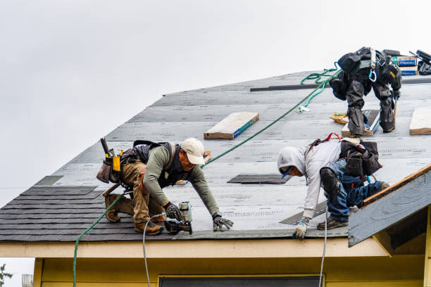 Professional Gutter Installation technician working in Tensed, ID